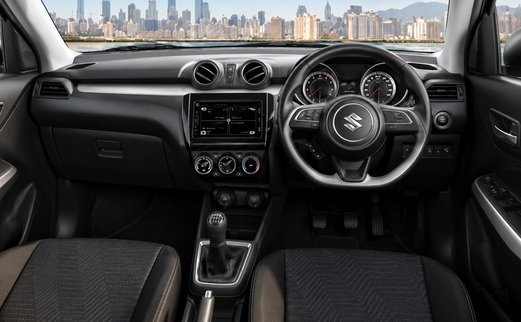 /adobe/assets/urn:aaid:aem:ffcd1e4c-6082-48fa-b23c-0edb4c7b44d2/as/auto-expo-2018-swift-interior.png?height=987&width=1594